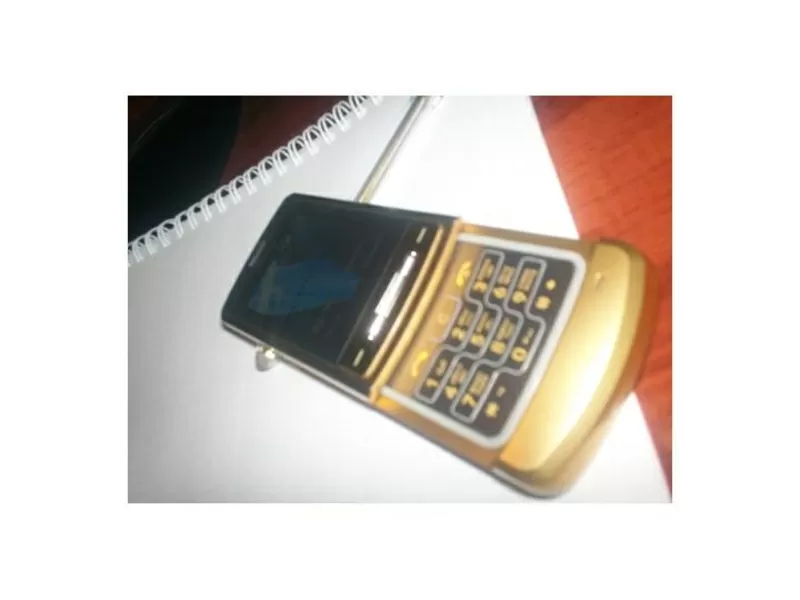 Продам б/у Золотой телефон LG КЕ 970 2